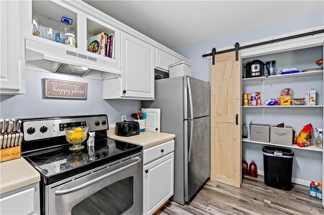 115 Donna Dr, Dawsonville, GA 30534 - kitchen featuring stainless steel appliances, open shelves, light wood-style floors, and white cabinets