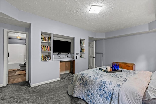 115 Donna Dr, Dawsonville, GA 30534 - bedroom featuring carpet floors, a textured ceiling, and connected bathroom