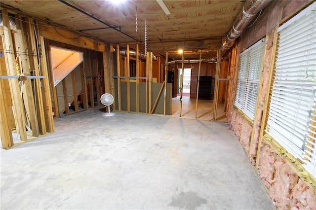 misc room with plenty of natural light and concrete floors