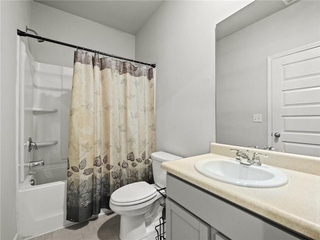 bathroom with shower / bath combo, tile patterned flooring, toilet, and vanity