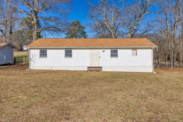 view of outdoor structure with fence