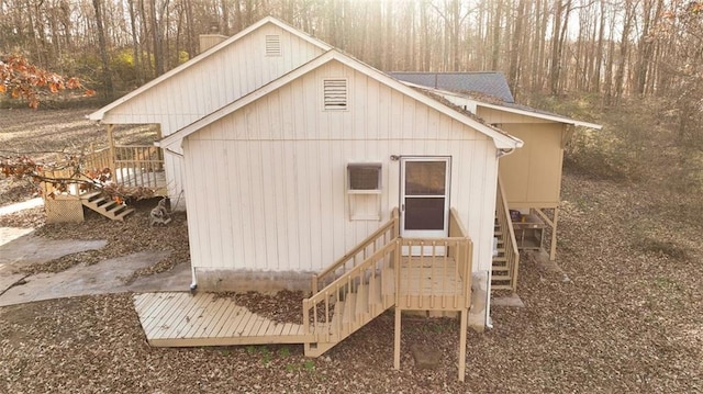 rear view of house with a deck