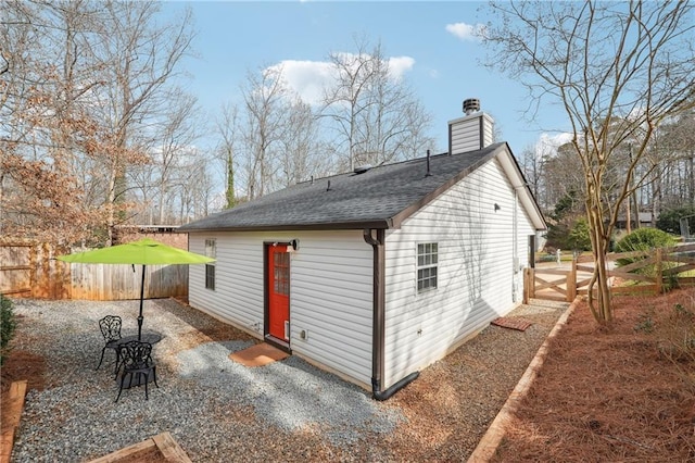 rear view of property featuring a patio area