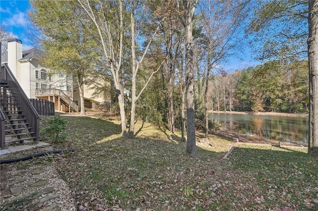 view of yard with a water view