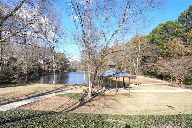 exterior space with a gazebo and a water view