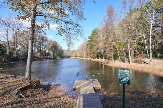 dock area featuring a water view