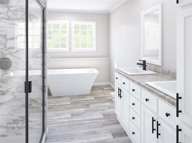 bathroom with vanity, wood-type flooring, and shower with separate bathtub