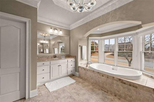 bathroom featuring crown molding, vanity, a notable chandelier, a relaxing tiled tub, and tile patterned flooring