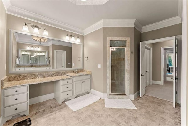 bathroom featuring ornamental molding, vanity, and a shower with door