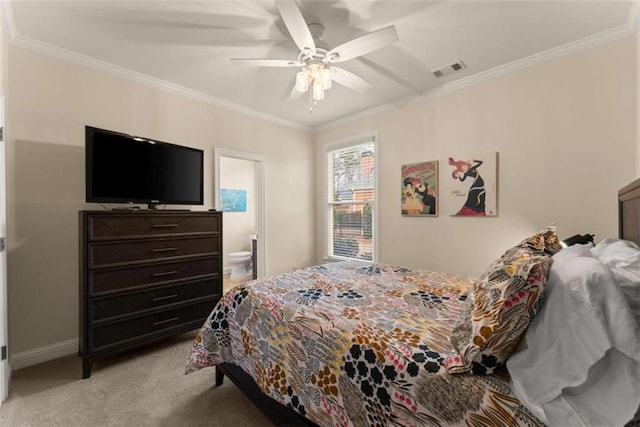 bedroom with ornamental molding, light carpet, ceiling fan, and ensuite bath