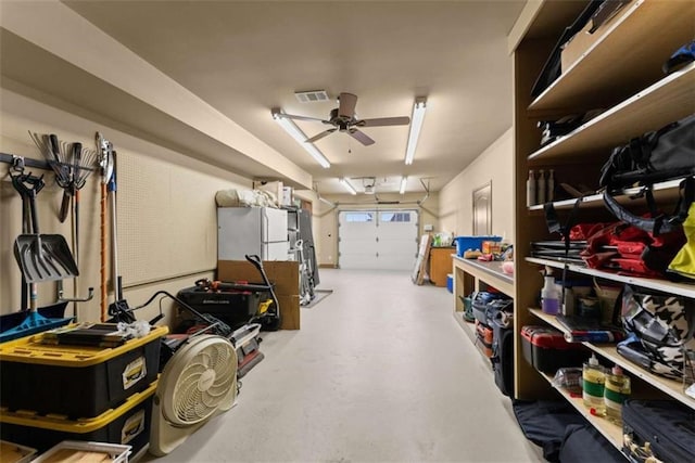 garage featuring ceiling fan