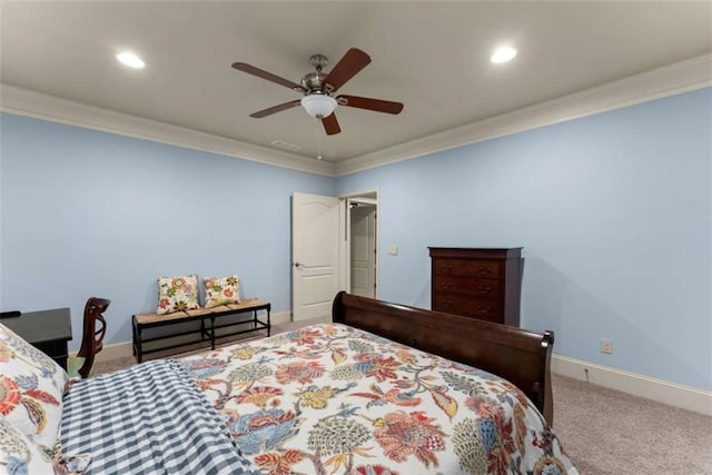 bedroom featuring crown molding, ceiling fan, and carpet floors