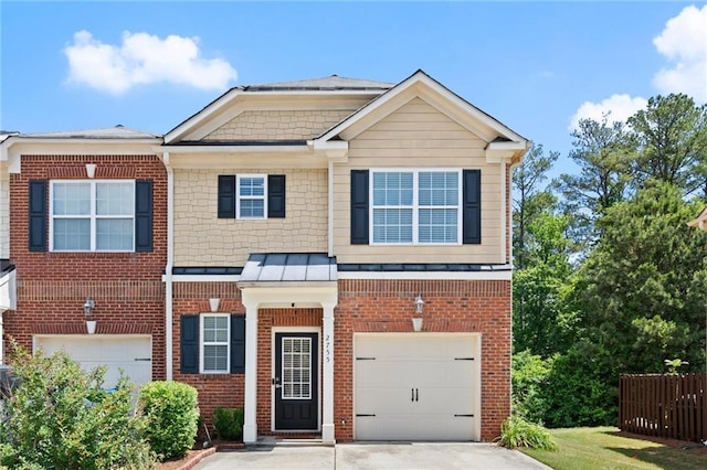 view of front of house with brick siding, a garage, concrete driveway, a standing seam roof, and fence