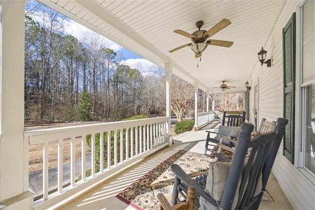 deck featuring ceiling fan and covered porch