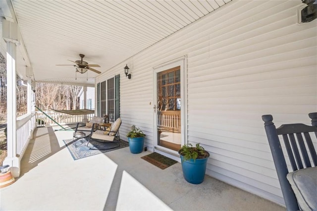 view of patio / terrace with ceiling fan and covered porch