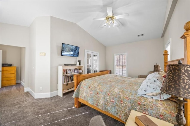 carpeted bedroom with ceiling fan and lofted ceiling