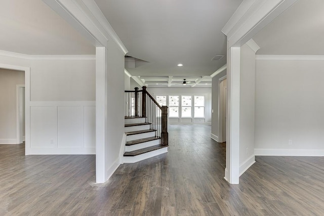 stairs with hardwood / wood-style flooring, ceiling fan, and ornamental molding