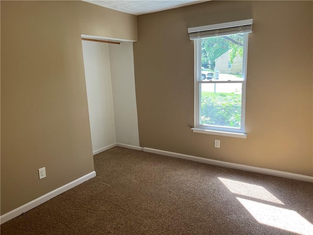 2705 Rhoanoke Dr, Duluth, GA 30096 - empty room featuring baseboards and carpet