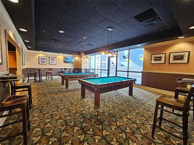 rec room with crown molding, pool table, a drop ceiling, and carpet