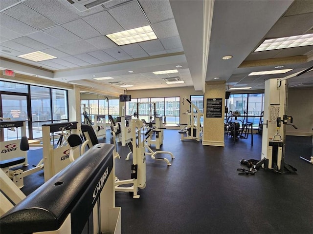 gym featuring a paneled ceiling