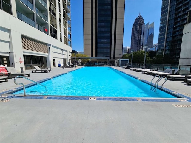 view of pool with a patio