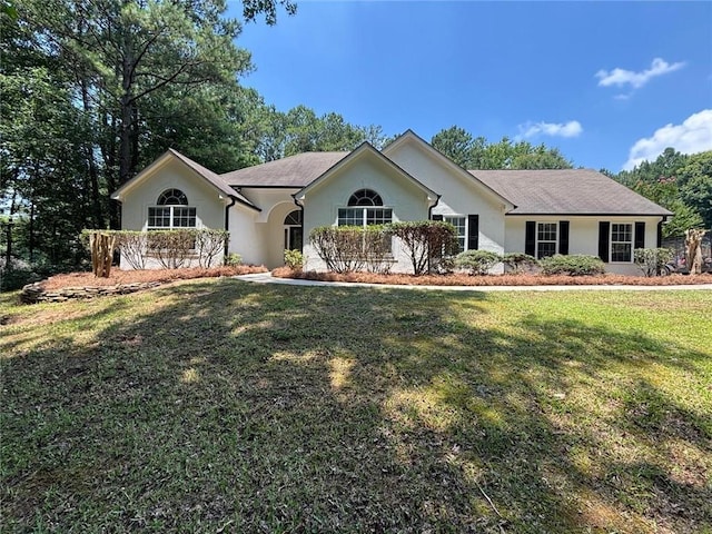 12 Barrington Ct, Sharpsburg, GA 30277 - ranch-style house featuring a front lawn and stucco siding