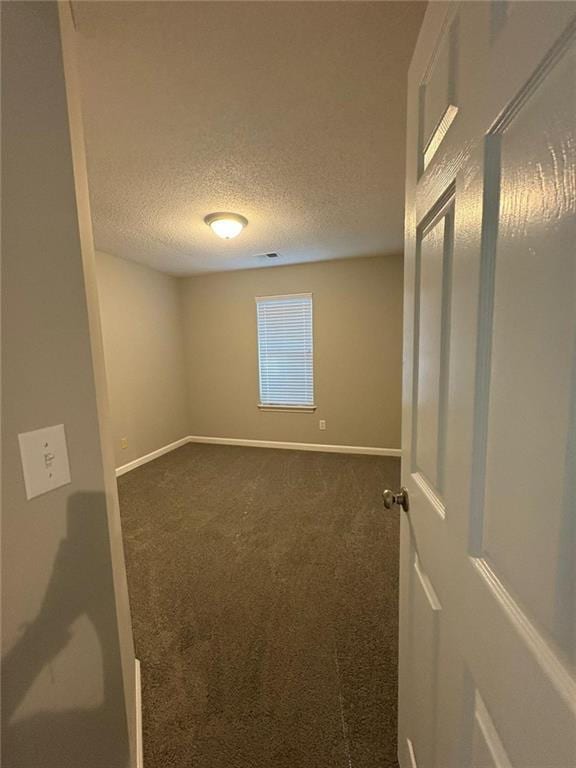 12 Barrington Ct, Sharpsburg, GA 30277 - unfurnished room with carpet floors and a textured ceiling