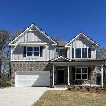 3064 Steinbeck Way, Atlanta, GA 30344 - craftsman inspired home featuring board and batten siding, covered porch, and a garage