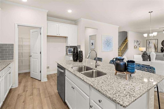 3064 Steinbeck Way, Atlanta, GA 30344 - kitchen with a sink, dishwasher, light wood-style flooring, white cabinetry, and ornamental molding