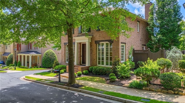 175 Centennial Trce, Roswell, GA 30076 - view of front of house with brick siding and a chimney