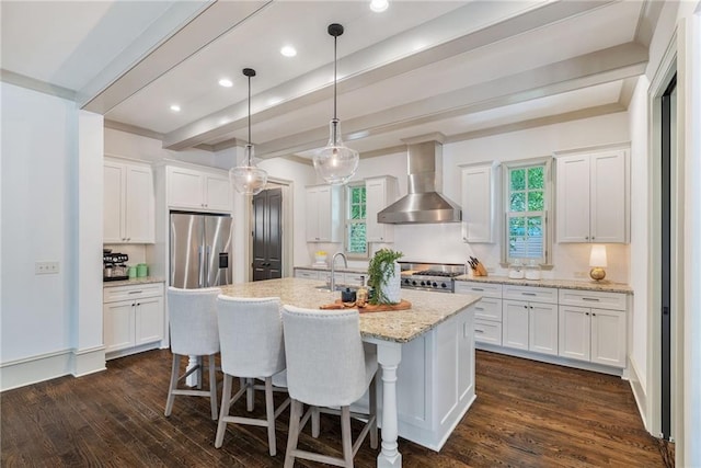 175 Centennial Trce, Roswell, GA 30076 - kitchen featuring wall chimney exhaust hood, stainless steel fridge, backsplash, white cabinetry, and beamed ceiling