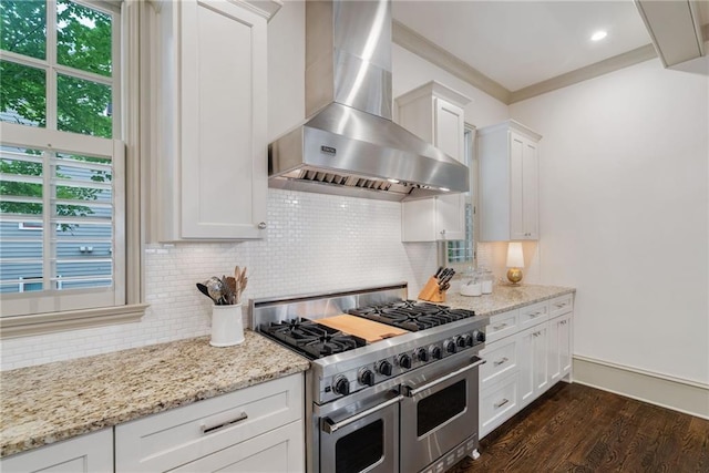 175 Centennial Trce, Roswell, GA 30076 - kitchen with wall chimney range hood, range with two ovens, decorative backsplash, dark wood-style flooring, and white cabinets