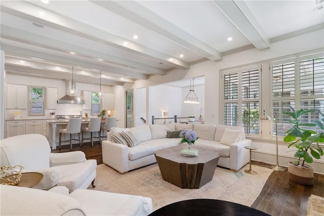 175 Centennial Trce, Roswell, GA 30076 - living room featuring wood finished floors, beam ceiling, plenty of natural light, recessed lighting, and a chandelier