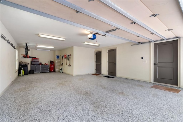 175 Centennial Trce, Roswell, GA 30076 - garage with a garage door opener and baseboards