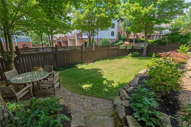 175 Centennial Trce, Roswell, GA 30076 - fenced backyard with a patio and a gate
