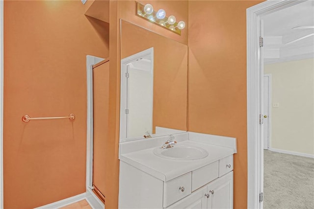 bathroom featuring vanity and baseboards