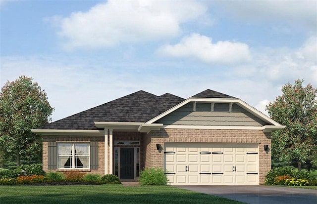 view of front of property featuring a garage, driveway, brick siding, and a front yard