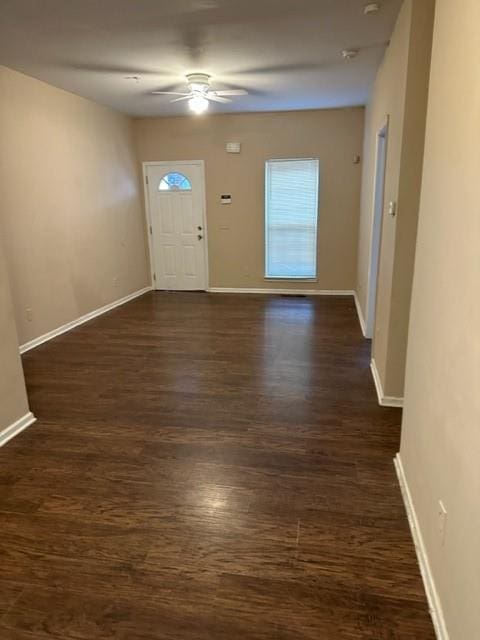 entrance foyer featuring ceiling fan and dark hardwood / wood-style floors