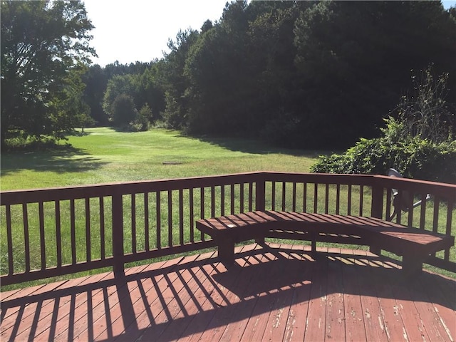 wooden deck with a yard