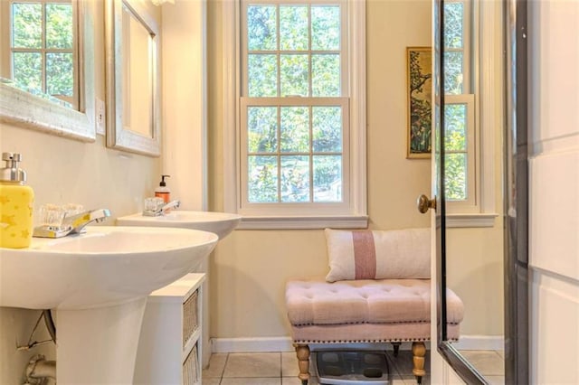 bathroom with tile patterned flooring