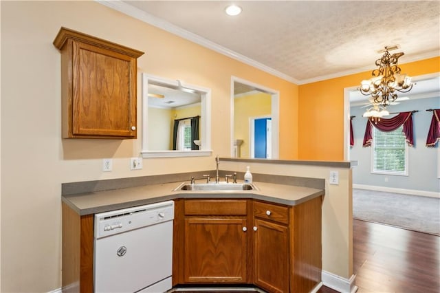 99 Rainwater Ln, Dallas, GA 30157 - kitchen with dishwasher, a sink, brown cabinetry, crown molding, and wood finished floors