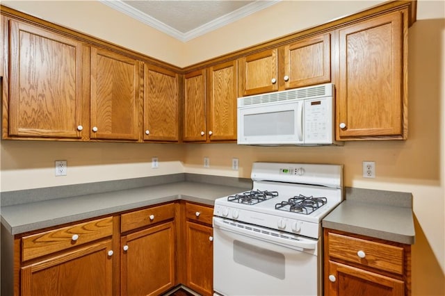 99 Rainwater Ln, Dallas, GA 30157 - kitchen featuring white appliances, crown molding, and brown cabinets