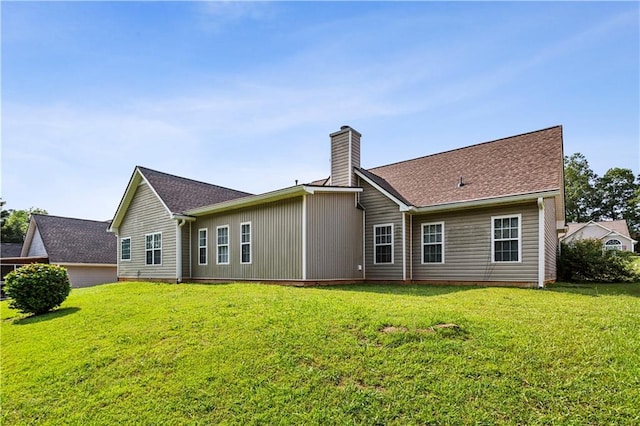 99 Rainwater Ln, Dallas, GA 30157 - rear view of property with a chimney and a lawn