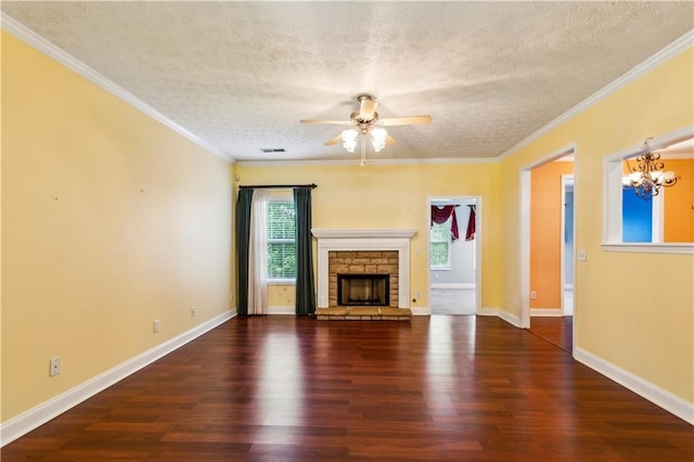 99 Rainwater Ln, Dallas, GA 30157 - unfurnished living room featuring healthy amount of natural light, wood finished floors, a ceiling fan, a textured ceiling, and crown molding