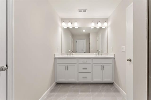 1987 Deco Dr, Kennesaw, GA 30144 - full bathroom with double vanity and baseboards