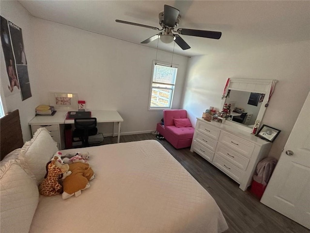 bedroom featuring ceiling fan and dark wood-style flooring