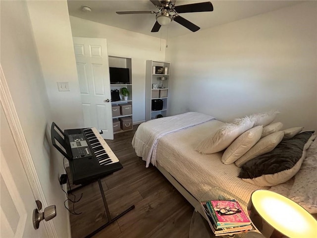 bedroom featuring dark wood-style floors and ceiling fan