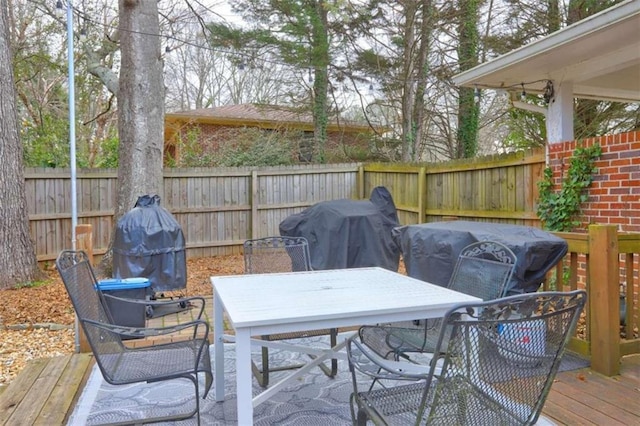 wooden terrace with grilling area