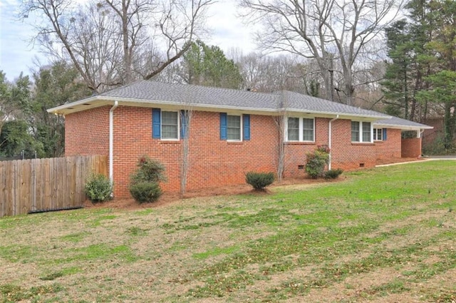 view of property exterior with a yard