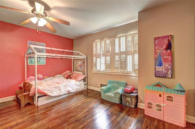 bedroom featuring wood-type flooring and ceiling fan